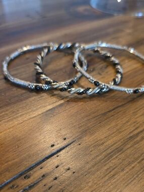 Set Of 3 Silver Toned Bangle Braclets With Black Accents